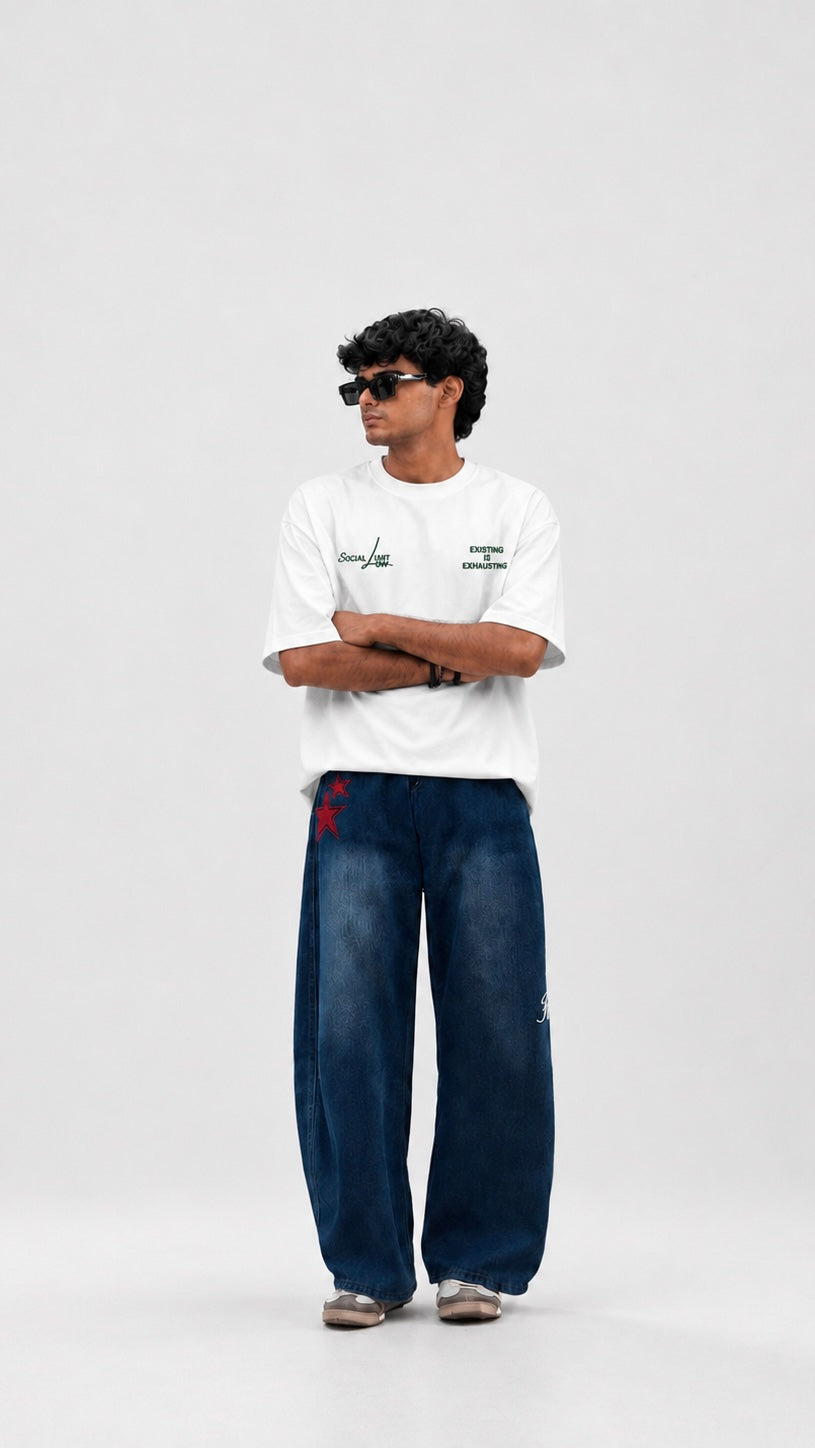 Person wearing a white t-shirt with text on the back, standing against a white background